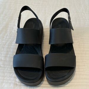 Black croc platforms with heel strap